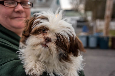 Close-up portrait of woman with dog