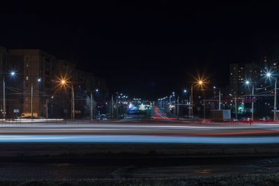 Light trails on road at night