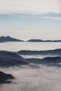 Aerial view of mountains in foggy weather