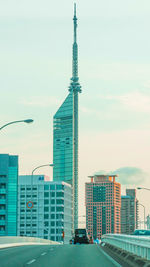 View of buildings in city against sky