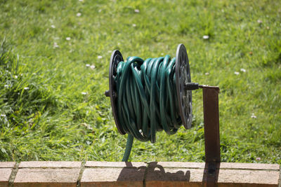 Close up of a rolled up garden hose