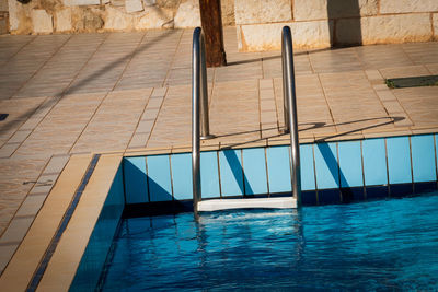 Reflection of swimming pool in water