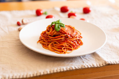 Italian spaghetti with tomato sauce, basil and extra virgin olive oil