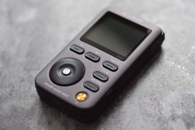 High angle view of smart phone on table