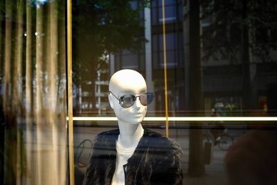 Close-up of man wearing hat at store