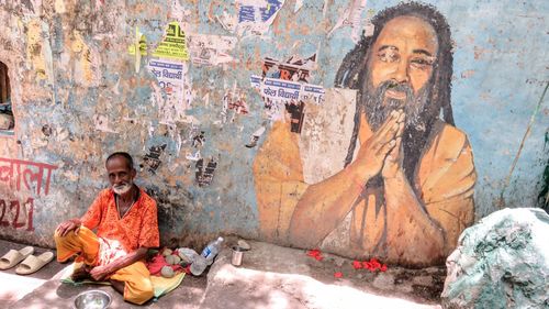 Portrait of children on wall