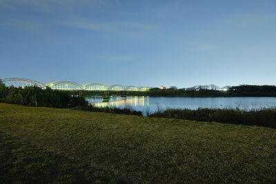 Scenic view of lake against blue sky