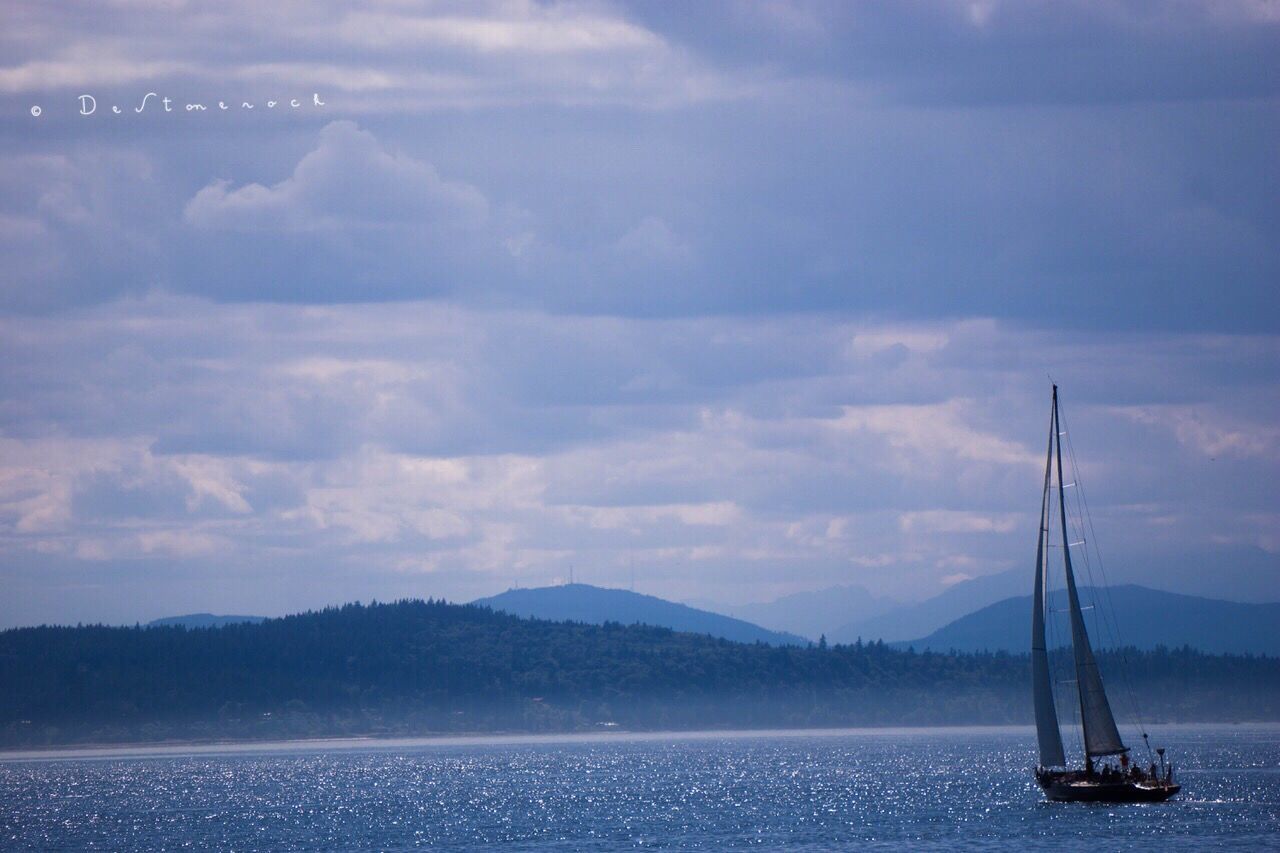 sky, cloud - sky, water, beauty in nature, scenics, outdoors, transportation, nature, no people, nautical vessel, mountain, tranquil scene, tranquility, sea, day, sailboat