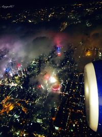 Firework display at night