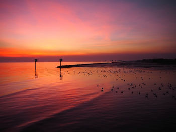 Scenic view of sea against sky during sunset