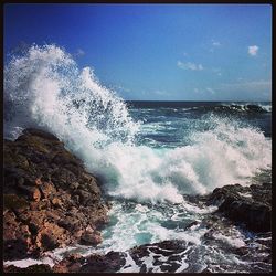 Waves splashing on rocks