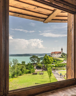 Scenic view of sea seen through window