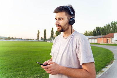 Young man using mobile phone