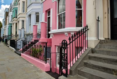 Staircase by building in city