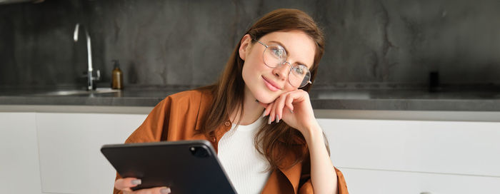 Young woman using mobile phone