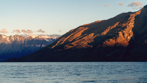 Scenic view of mountains against sky during sunset