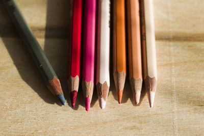 High angle view of colored pencils on table