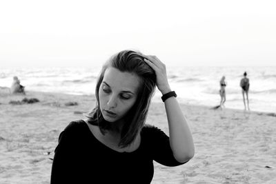 Portrait of young woman on beach