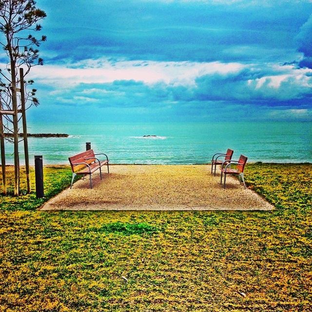 sea, horizon over water, sky, water, beach, tranquility, tranquil scene, cloud - sky, scenics, beauty in nature, nature, bench, cloud, empty, sand, cloudy, shore, relaxation, absence, idyllic