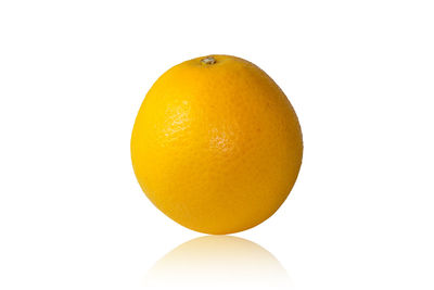 Close-up of lemon against white background