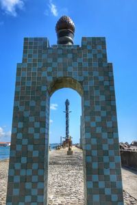 Low angle view of built structure against blue sky