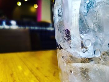 Close-up of glasses on table