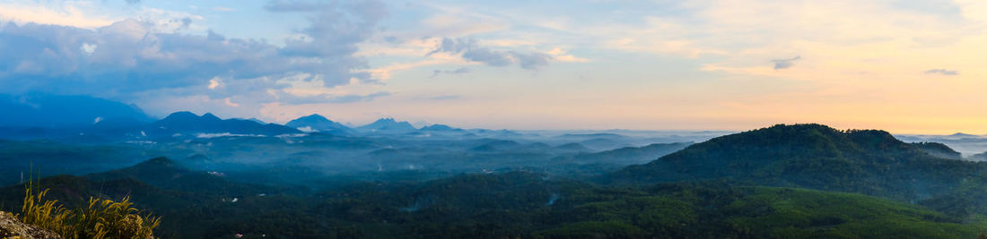 Scenic view of mountains against sky during sunset