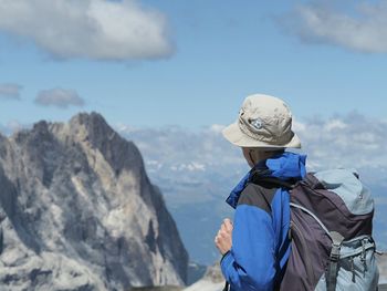 Rear view of hiker looking at view