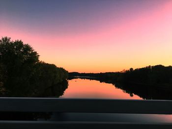 Scenic view of silhouette trees against sky during sunset