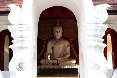 Statue of buddha in building