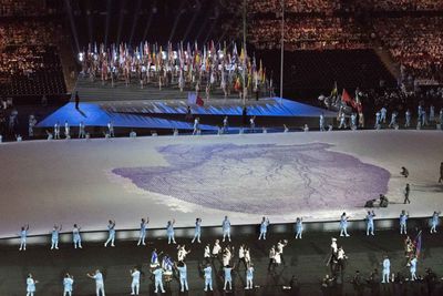 Panoramic view of people at night