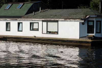 Building by river in city