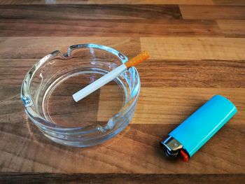 High angle view of drink in glass on table