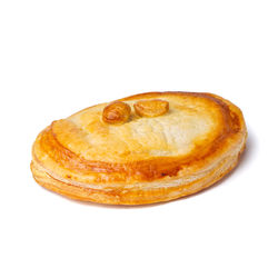 Close-up of bread against white background