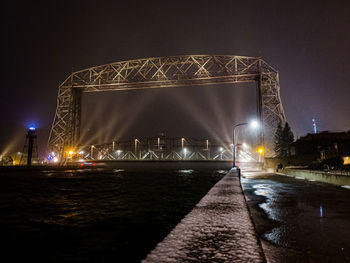 Snowy night bridge 