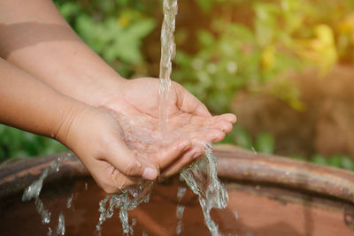 Close-up of water splashing from faucet