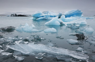 High angle view of iceberg in sea