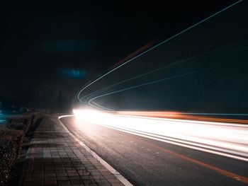 Light trails on road at night