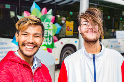 Portrait of a smiling young man outdoors