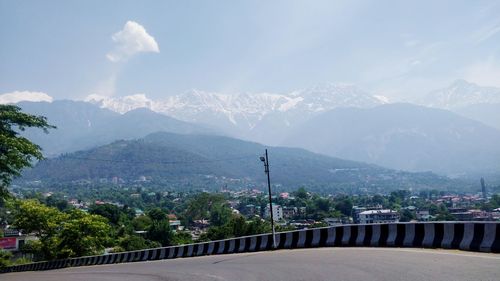 High angle view of townscape against mountain range