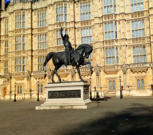 View of statue in front of building