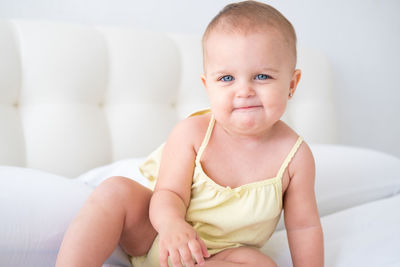 Portrait of cute baby boy at home