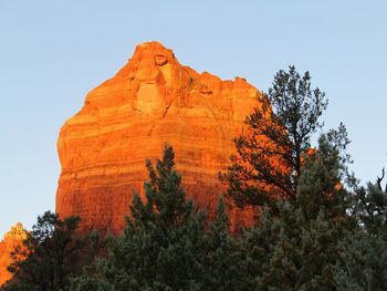 Low angle view of rock formation against sky