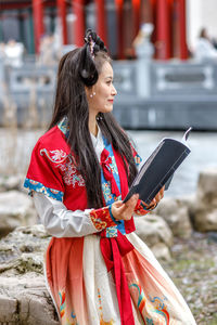 Young woman using mobile phone