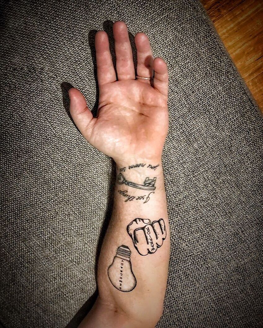 human body part, tattoo, human hand, hand, one person, body part, indoors, human limb, limb, real people, text, adult, high angle view, lifestyles, creativity, art and craft, communication, fashion, men, human arm, finger