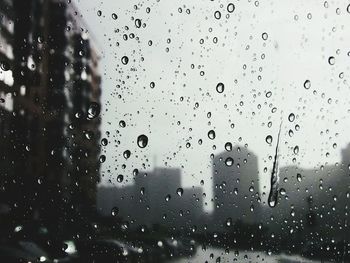 Full frame shot of raindrops on window