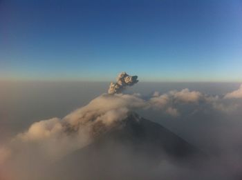 Scenic view of volcanic mountain against sky