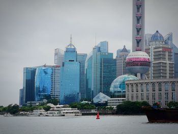 View of modern buildings against sky