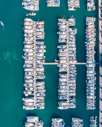 Boats docked in a harbor from above