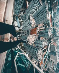 Low section of man on building in city